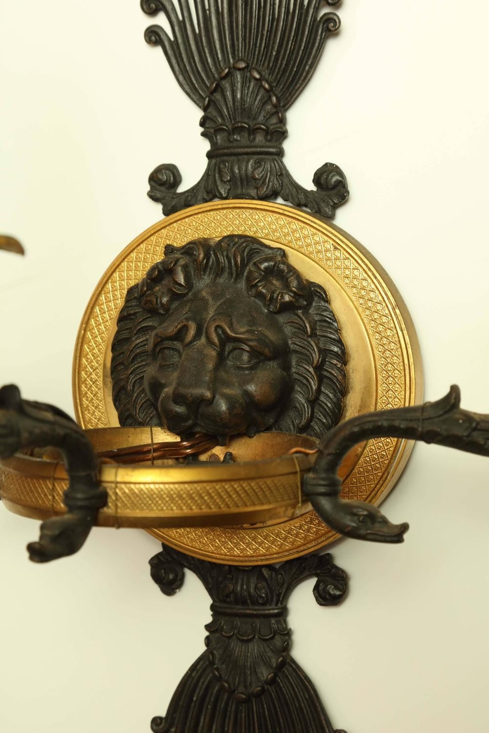 Pair of French Empire gilt bronze Sconces