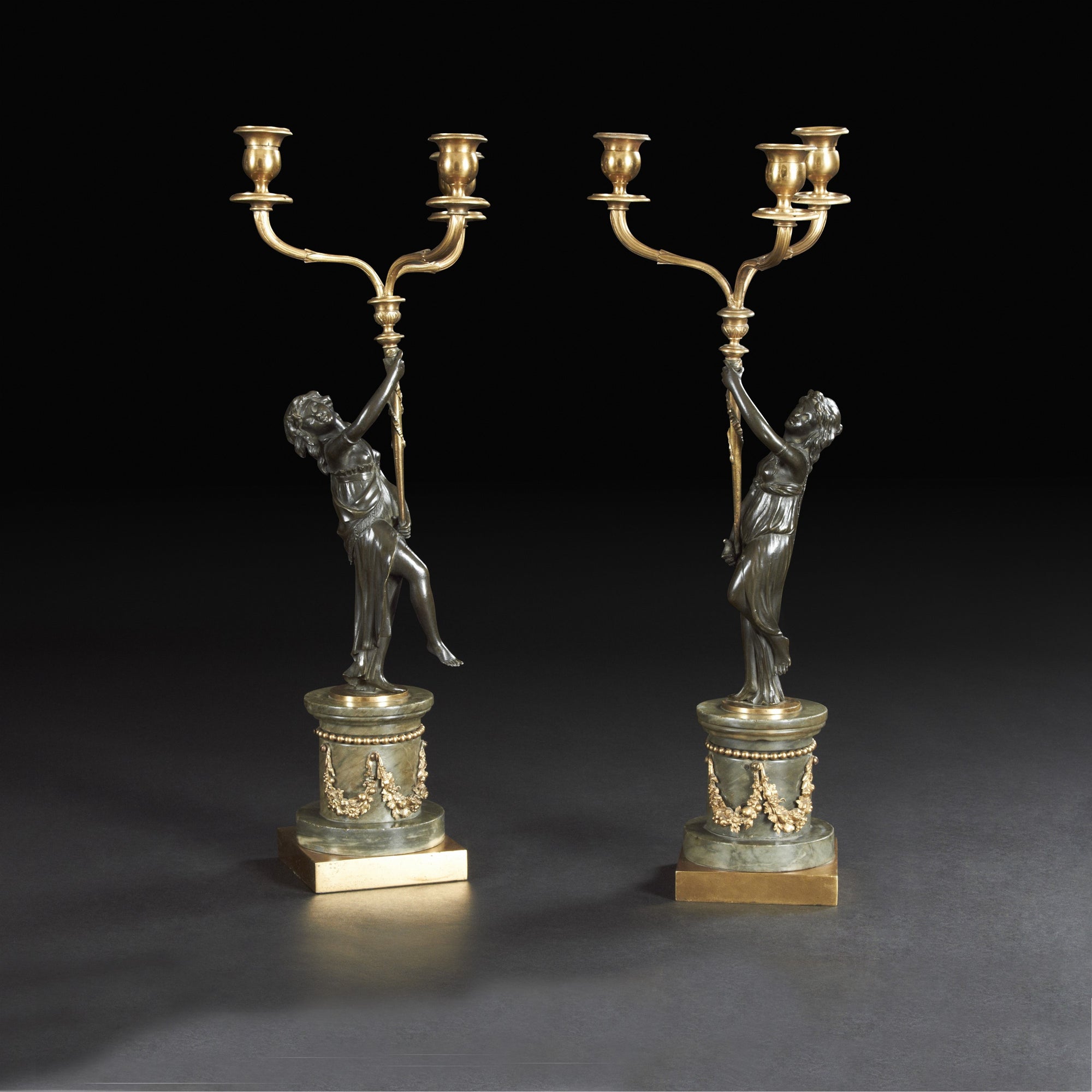 Pair of Louis XVI Bronze Figural Candleabra