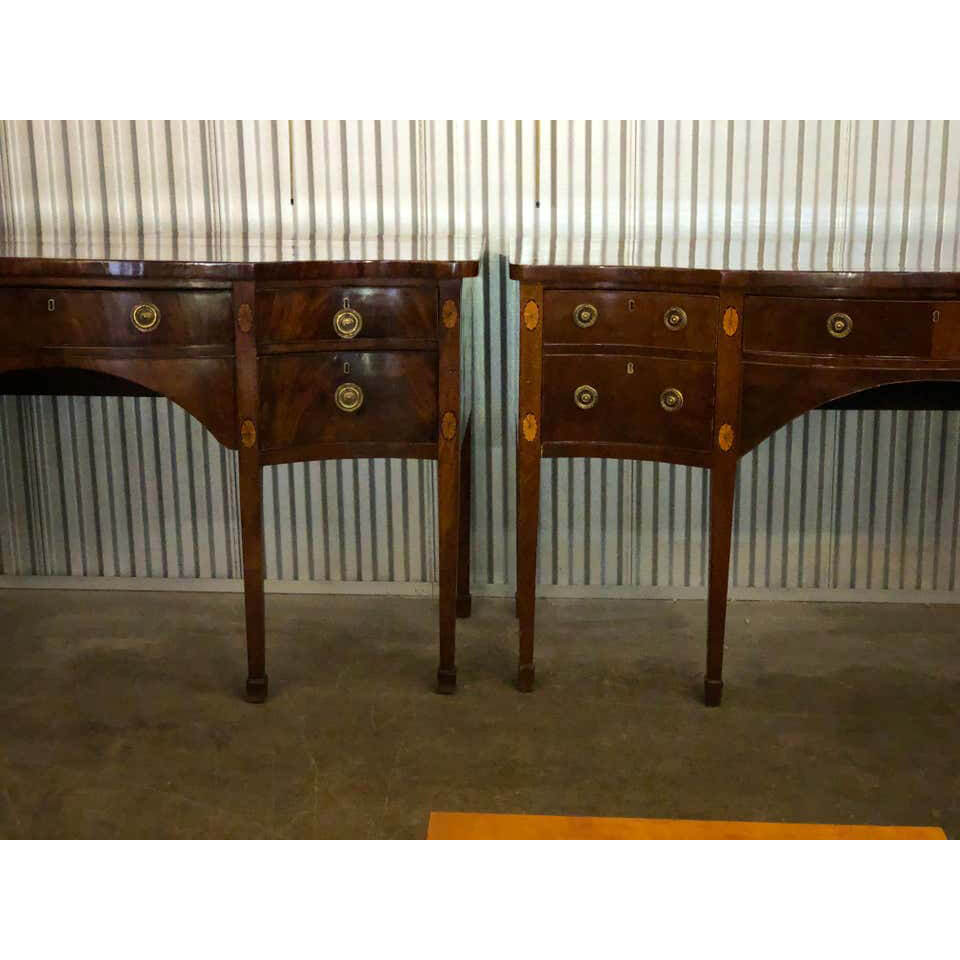 Pair of George III Mahogany Serpentine Sideboards