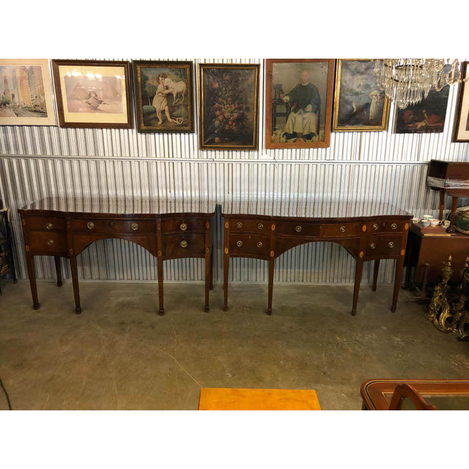 Pair of George III Mahogany Serpentine Sideboards